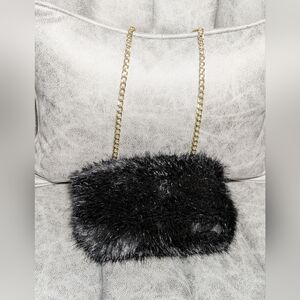 Women's Black Faux Fur Purse with Gold Toned Chain‎